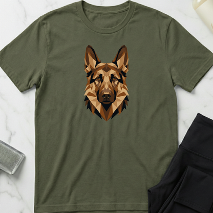 Green t-shirt with a geometric dog illustration on a white marble surface. Minimalist dog apparel by pemuyo.