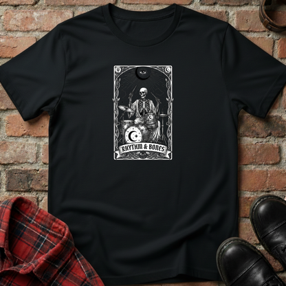 Black t-shirt with skeleton design and 'Rhythm & Bones' text on a brick wall background. Minimalist music apparel by pemuyo.