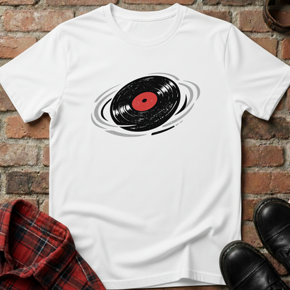 White t-shirt with vinyl record design on a brick surface. Minimalist music apparel by pemuyo.