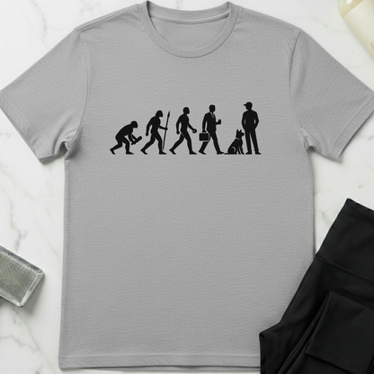 Gray t-shirt with black graphic design on a white marble surface. Minimalist dog apparel by pemuyo.