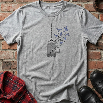 Gray t-shirt with a birdcage and musical notes design on a brick background. Minimalist music apparel by pemuyo.