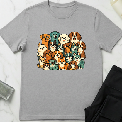 Gray t-shirt with colorful dog illustrations on a white marble surface. Minimalist dog apparel by pemuyo.