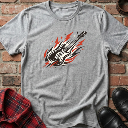 Gray t-shirt with a guitar graphic on a brick surface. Minimalist music apparel by pemuyo.