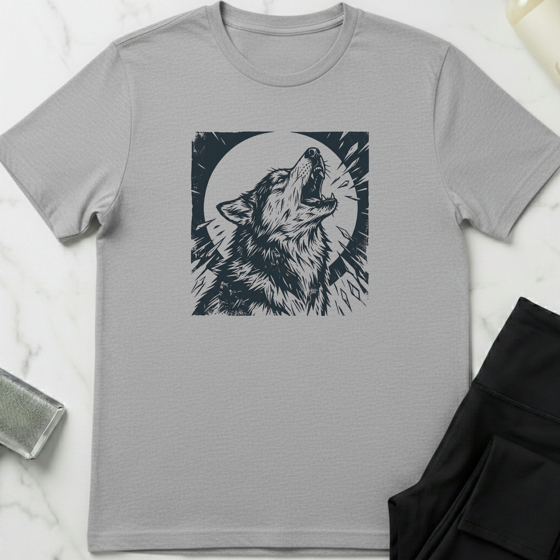 Gray t-shirt with a husky graphic on a light gray background. Minimalist dog apparel by pemuyo.