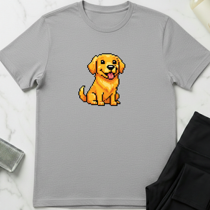Gray t-shirt with a pixelated yellow dog graphic on a marble surface. Minimalist dog apparel by pemuyo.