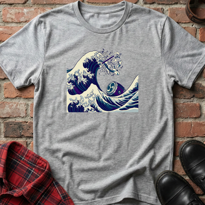 Gray t-shirt with a wave and guitar graphic on a brick background. Minimalist music apparel by pemuyo.