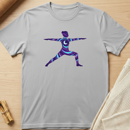 Gray t-shirt with a colorful yoga pose design on a wooden surface. Minimalist yoga apparel by pemuyo.