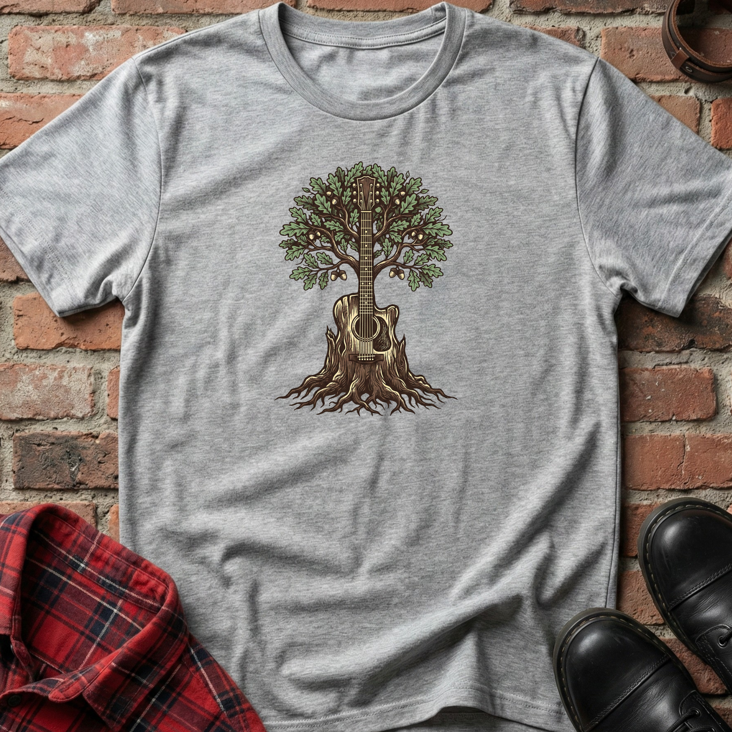 Gray t-shirt with a guitar tree design on a brick background. Minimalist music apparel by pemuyo.