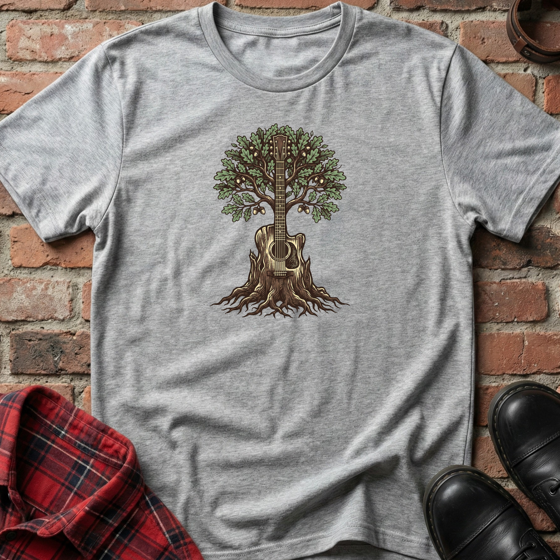 Gray t-shirt with a guitar tree design on a brick background. Minimalist music apparel by pemuyo.