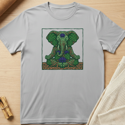 Gray t-shirt with a green elephant design on a wooden surface. Minimalist yoga apparel by pemuyo.