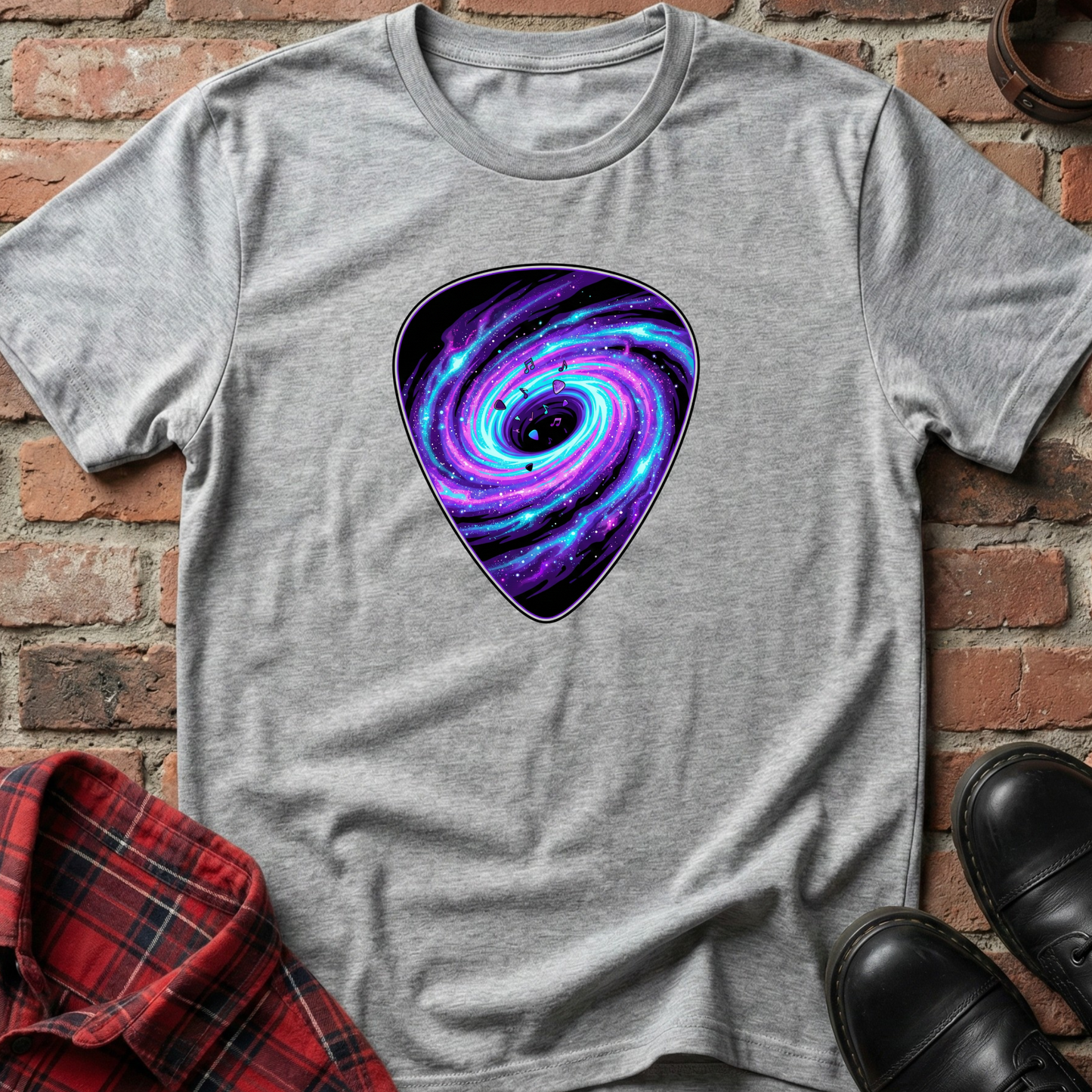 Gray t-shirt with a purple and blue spiral design on a brick surface. Minimalist music apparel by pemuyo.