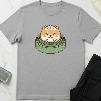 Gray t-shirt with a cute dog design on a marble surface. Minimalist dog apparel by pemuyo.
