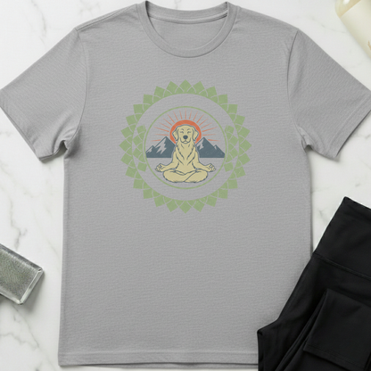 Gray t-shirt with a graphic of a meditating dog surrounded by mountains and a mandala on a white marble surface. Minimalist yoga apparel by pemuyo.