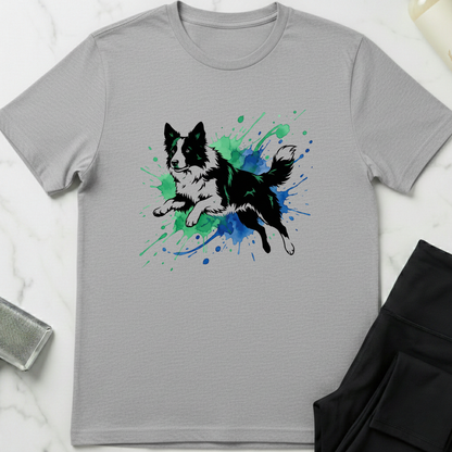 Gray t-shirt with a dog graphic on a white surface. Minimalist dog apparel by pemuyo.