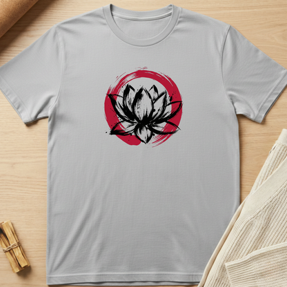 Gray t-shirt with black and red lotus flower design on a wooden surface. Minimalist yoga apparel by pemuyo.