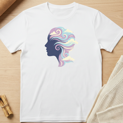 White t-shirt with a colorful silhouette design on a wooden surface. Minimalist yoga apparel by pemuyo.