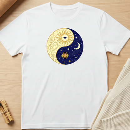 White t-shirt with a yin yang design featuring sun and moon on a wooden surface. Minimalist yoga apparel by pemuyo.