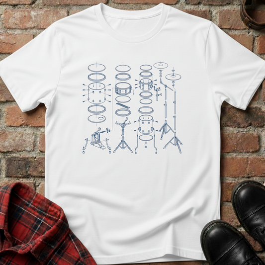 White t-shirt with drum set diagram design on a brick surface. Minimalist music apparel by pemuyo.
