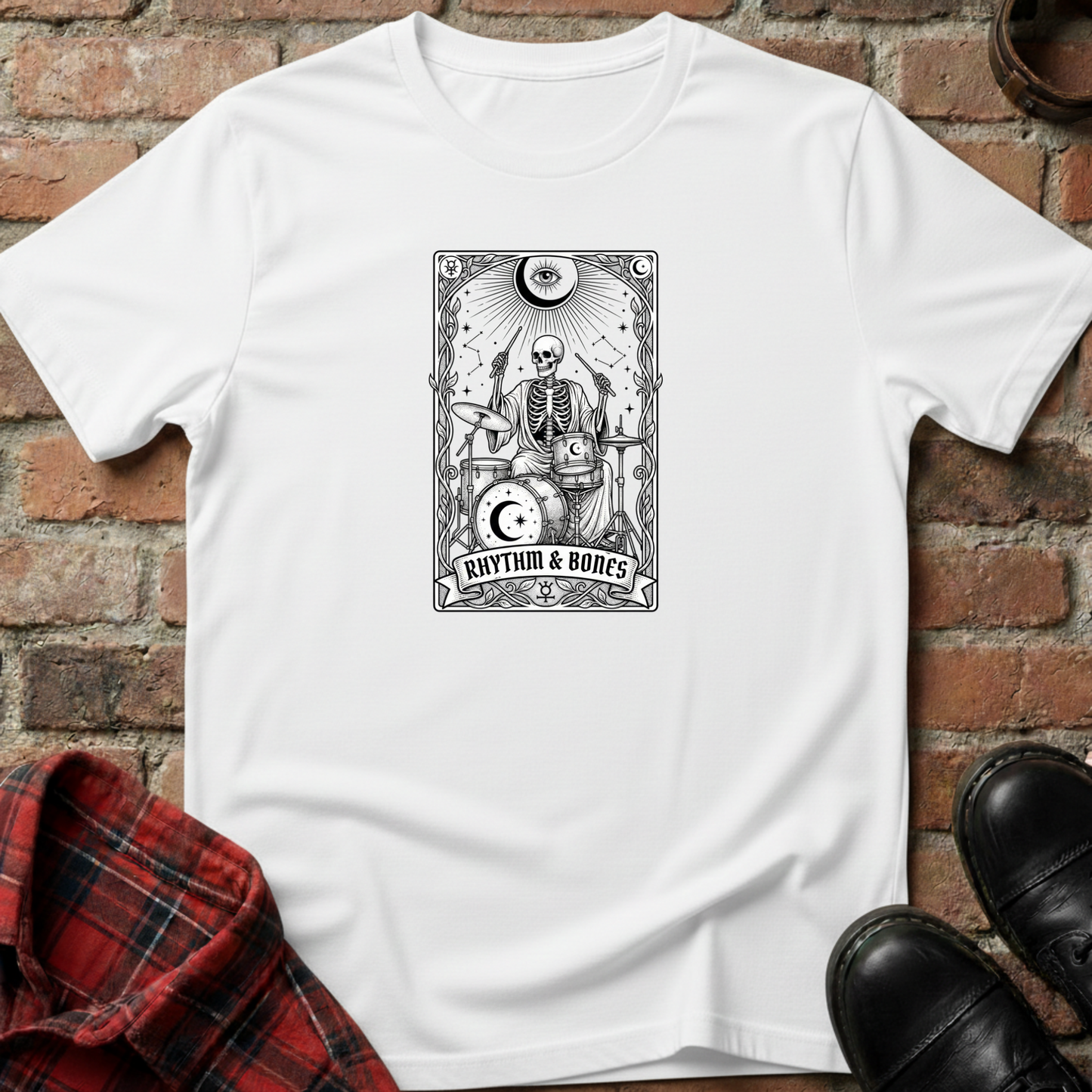 White t-shirt with skeleton design and 'Rhythm & Bones' text on a brick surface. Minimalist music apparel by pemuyo.