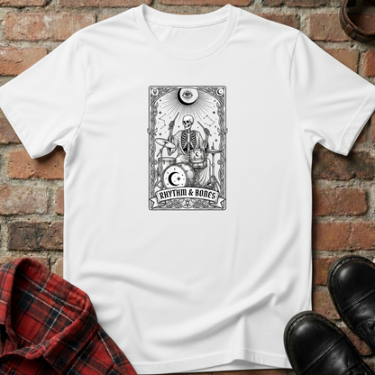 White t-shirt with skeleton design and 'Rhythm & Bones' text on a brick surface. Minimalist music apparel by pemuyo.