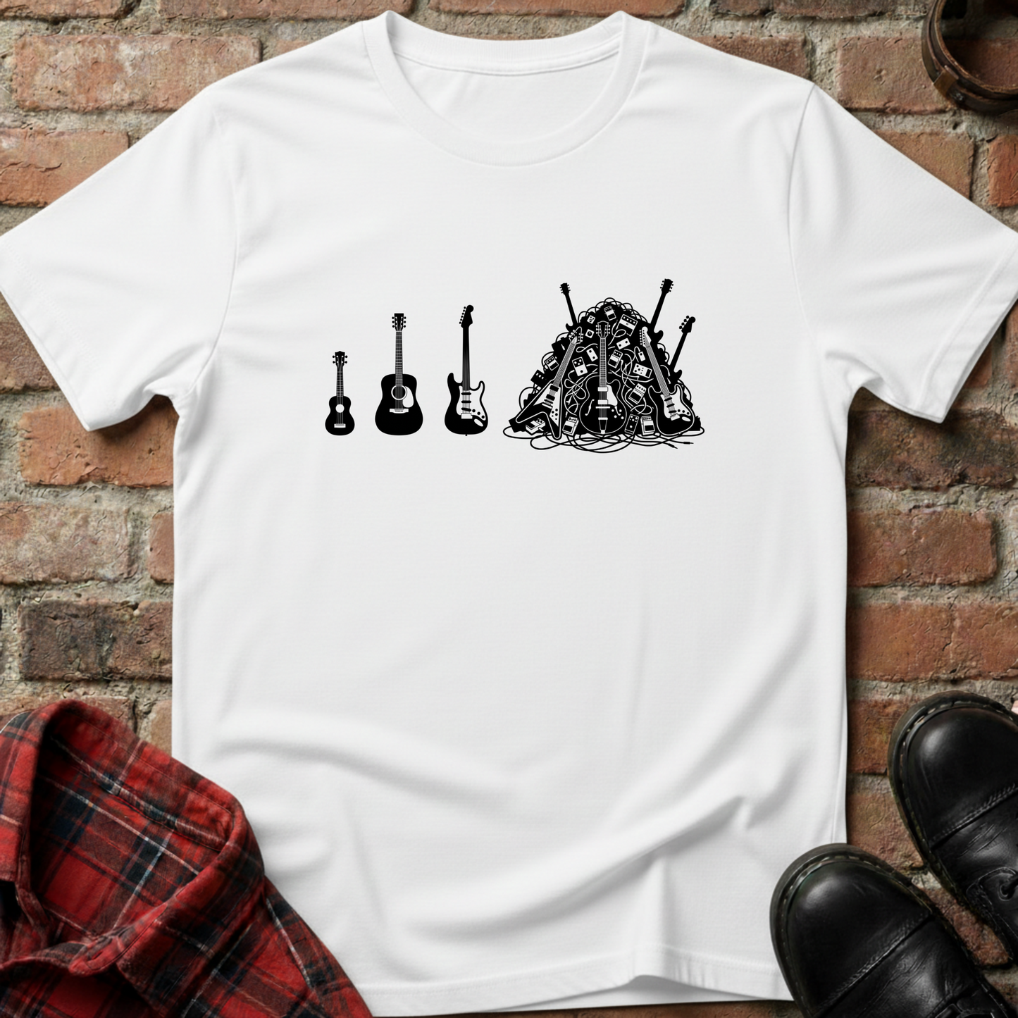 White t-shirt with black graphic design of guitars on a brick surface. Minimalist music apparel by pemuyo.