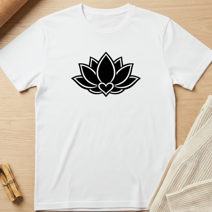 White t-shirt with a black lotus flower design on a wooden surface. Minimalist yoga apparel by pemuyo.