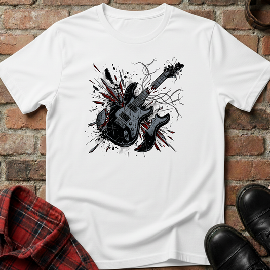 White t-shirt with black guitar graphic on a brick surface. Minimalist music apparel by pemuyo.