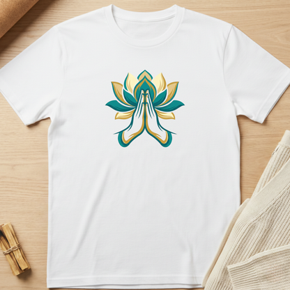 White t-shirt with a colorful lotus flower design on a wooden surface. Minimalist yoga apparel by pemuyo.