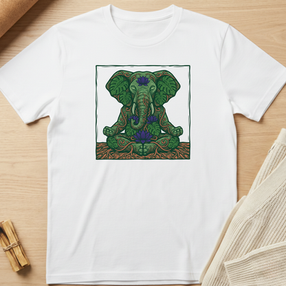White t-shirt with a green elephant design on a wooden surface. Minimalist yoga apparel by pemuyo.