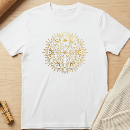 White t-shirt with a gold circular design on a wooden surface. Minimalist yoga apparel by pemuyo.