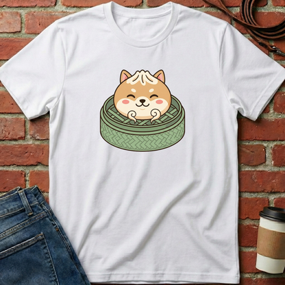 White t-shirt with a cartoon dog design on a brick wall background. Minimalist dog apparel by pemuyo.