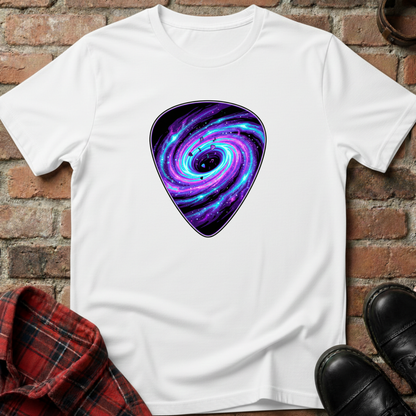 White t-shirt with a purple and blue galaxy design on a brick surface. Minimalist music apparel by pemuyo.