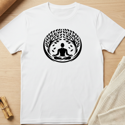 White t-shirt with a black meditation graphic on a wooden surface. Minimalist yoga apparel by pemuyo.